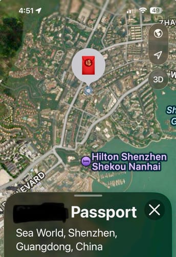Customer's screenshot of the Find My app showing the SPOTMINDERS Tracking Card locating their passport in Shenzhen, China.