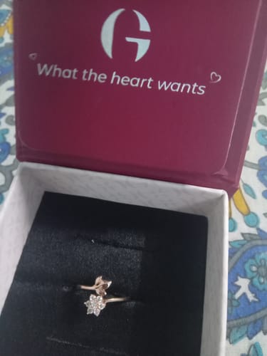Customer's Rose Gold Floral Chic Ring with a lovely floral design, shown inside its open presentation box.