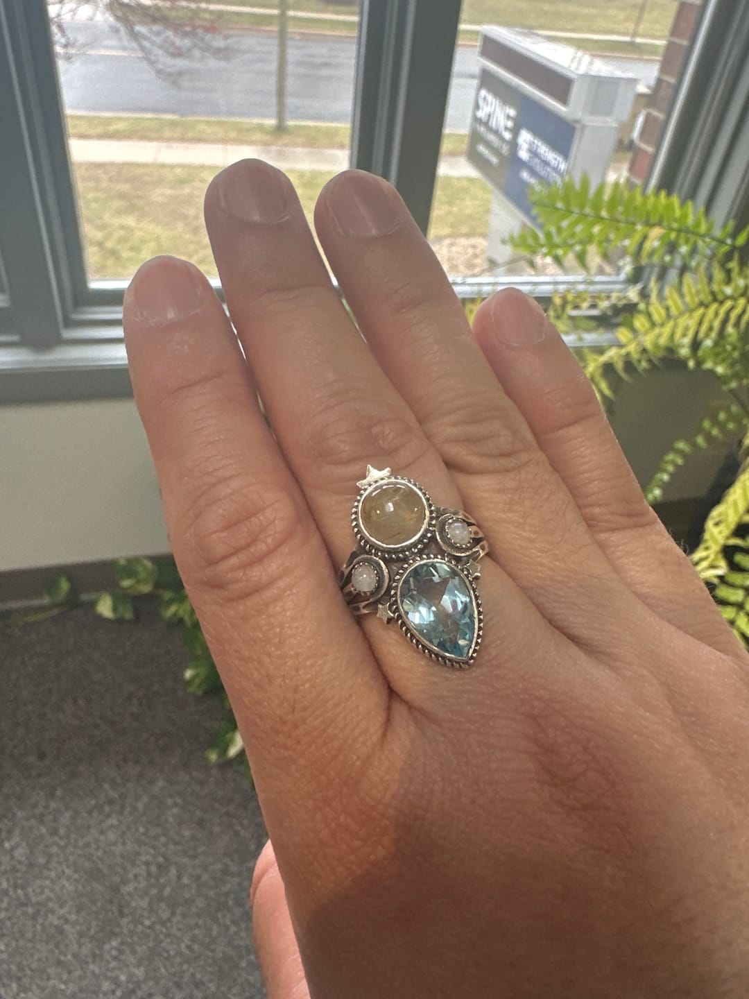 Customer photo review of Blue Topaz and Golden Rutilated Quartz Celestial Ring