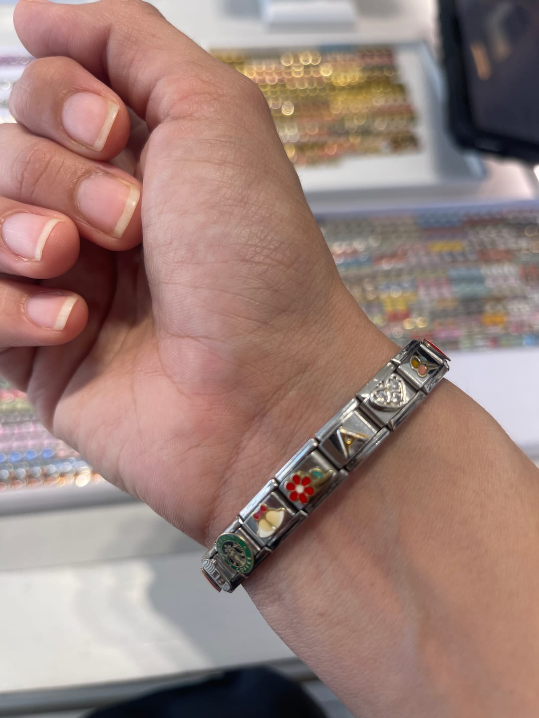 Customer photo review of Charm Inicial Dorada