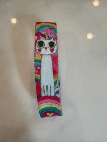 Customer's close-up of the colorful Sparkle on Bracelet, showing the woven caticorn design.