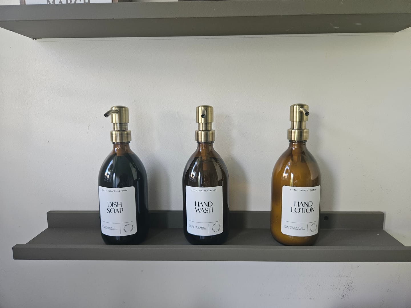 Customer photo review of Set of 3 Reusable Amber Glass Bottles 500 ML with Metal Pump and Long Tray