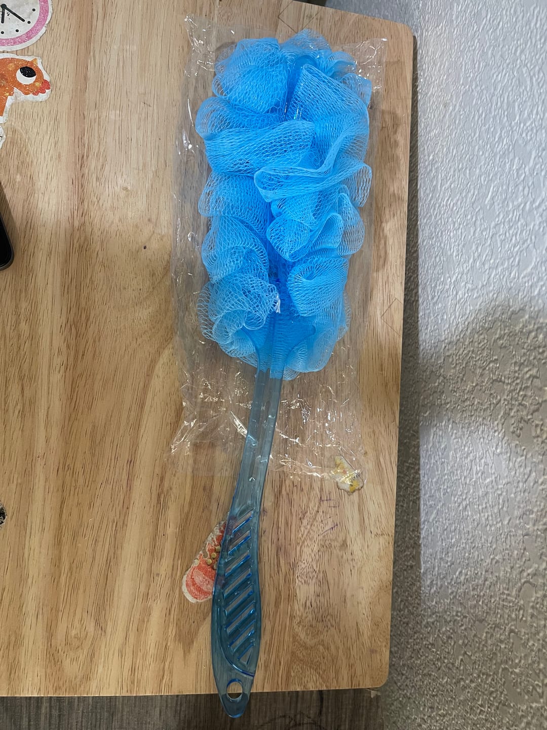 Customer photo review of Exfoliating Long Loofah Stick with Crystal Handle: 1 Pack