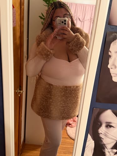 Reviewer in a mirror selfie wearing the My True Form Fawn Set, showing the fit of the bolero and fluffy skirt.