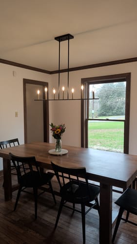 Customer photo review of Minimalist Black Brass Candle Style Linear Island Chandelier
