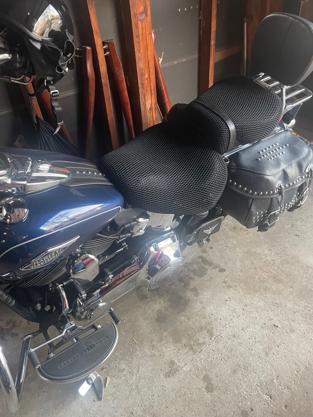 Wind Rider 3D mesh seat cover fitted over a Harley bagger seat, full bike parked in open shade, cooling airflow solution