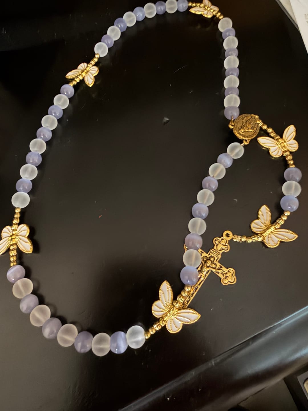 Customer photo review of FREE Today: Purple Cat's Eye & Matte Glass Butterfly Blessed Rosary: Embody Sacred Love and Grace