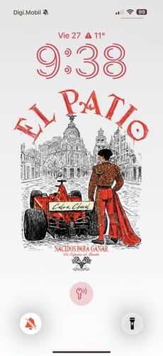 Customer's phone lock screen showing the RACING WALLPAPER with an illustrated matador next to a red F1 car.