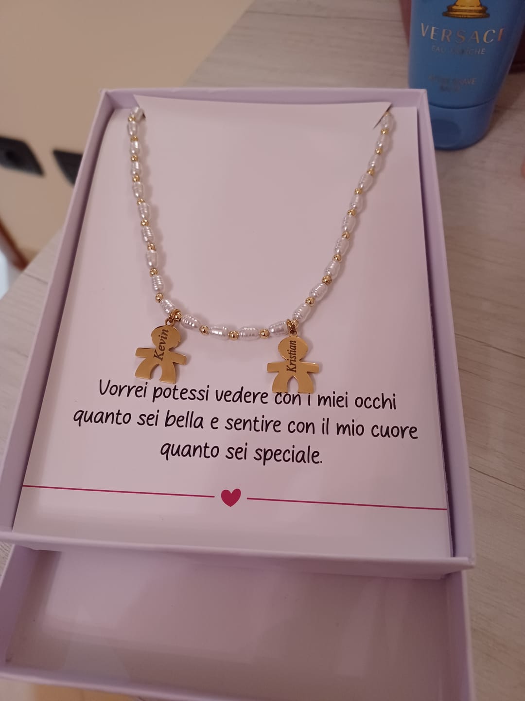 Customer photo review of Girocollo perline con bambini e incisione