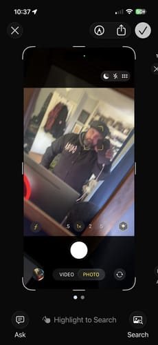 Reviewer's blurry mirror selfie wearing the black Gojira windbreaker.