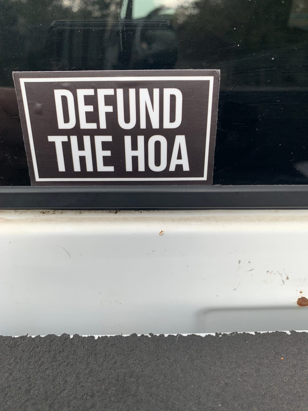 Customer photo review of Defund The HOA Sticker