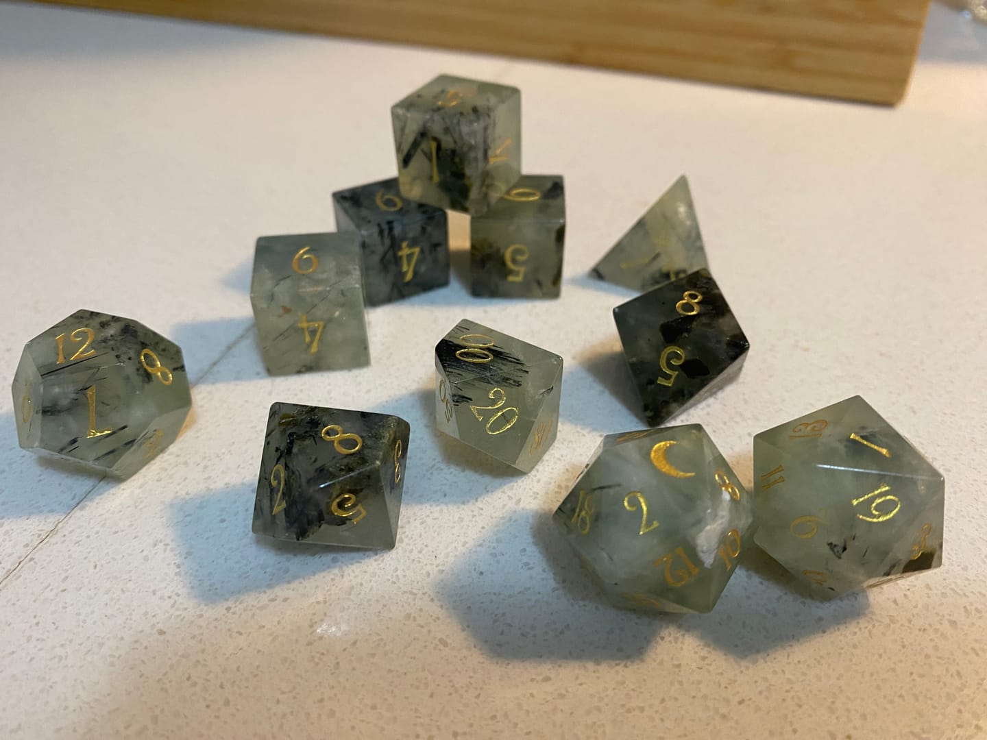Customer photo review of URWizards D&D Prehnite Gemstone Engraved Dice Set(Limited edition)