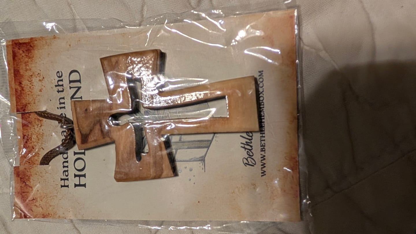 Customer photo review of Holy Land Jesus Olive Wood Cross Pendant