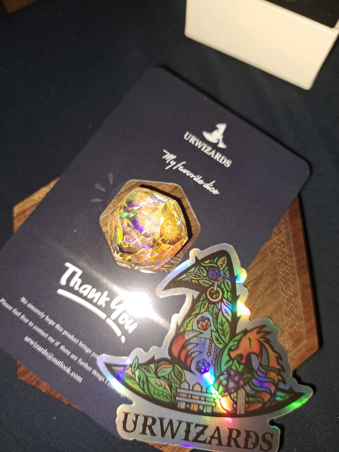 Customer photo review of URWizards D&D Multi-faceted Prism Glass Engraved Dice Set