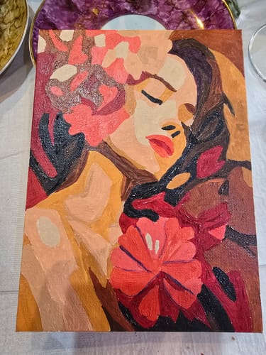 Customer's finished mini painting from the Flower Ladies Set, showing a colorful portrait of a woman with closed eyes.