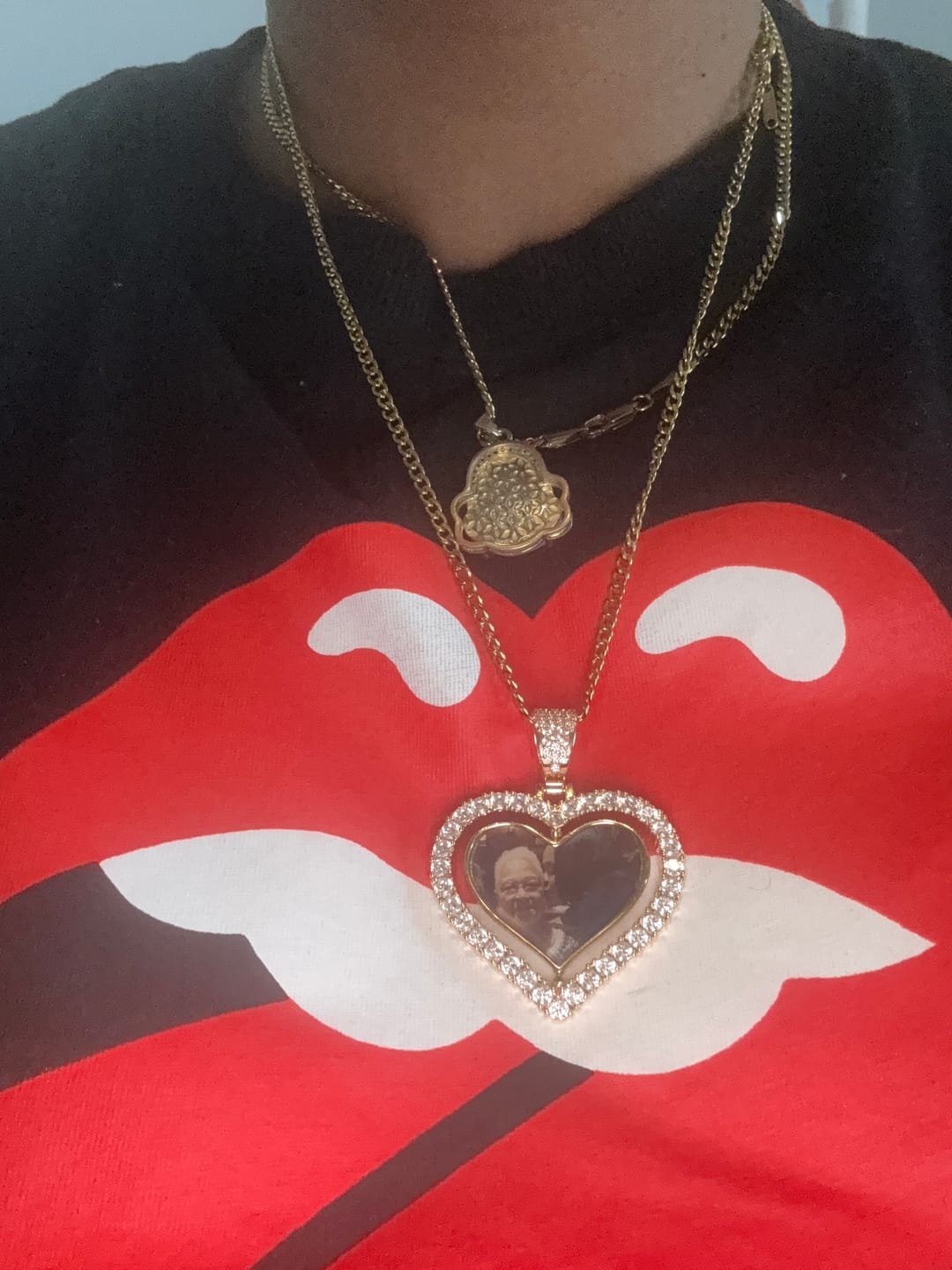 Customer photo review of Iced Heart Spinning Photo Pendant