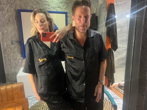 Reviewer and a person taking a mirror selfie while wearing matching black Dachshund Delight Silk Short Set tops.