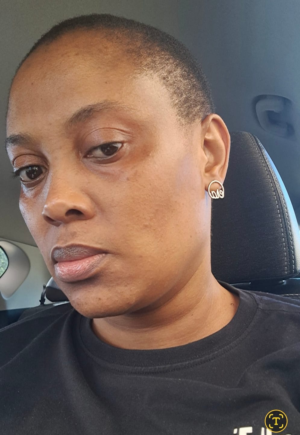 Customer photo review of Silver Era Logo Studs