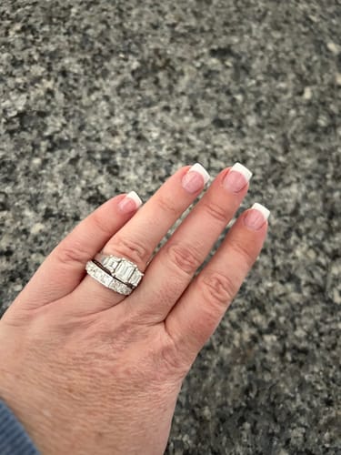 Customer photo review of Princess Moissanite Staircase Channel Set Half Eternity Wedding Band