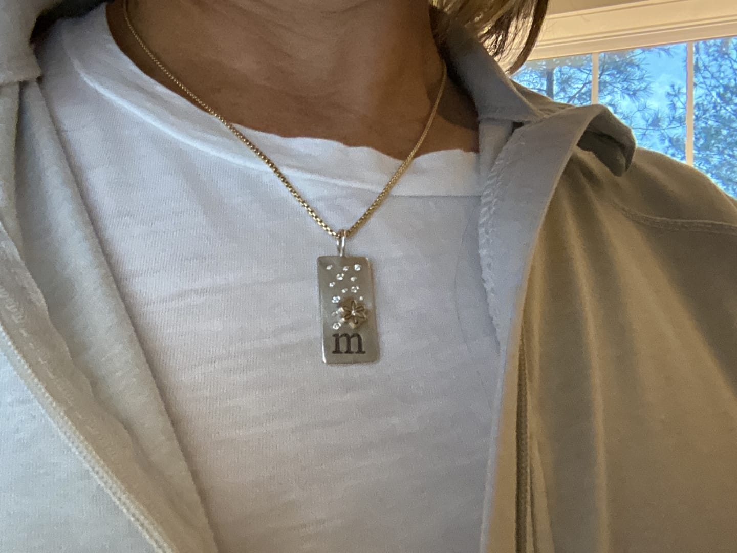Customer photo review of M Initial Daisy ID Tag