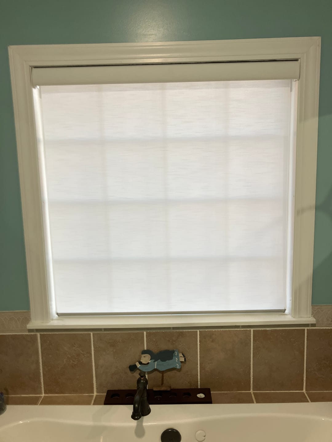 Customer photo review of SmartWings Motorized Light Filtering Roller Shades 70% Blackout Essential