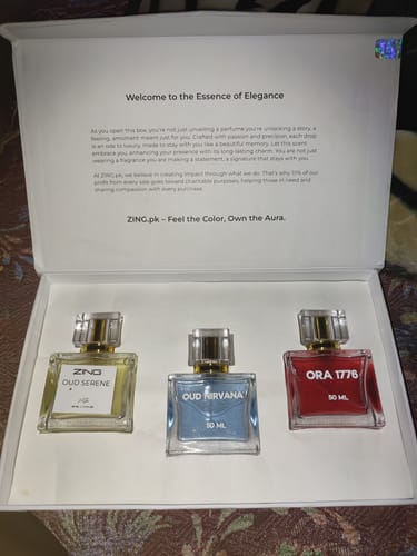 Customer's OUD Supreme BUNDLE featuring three colorful perfume bottles arranged neatly in their open white box.