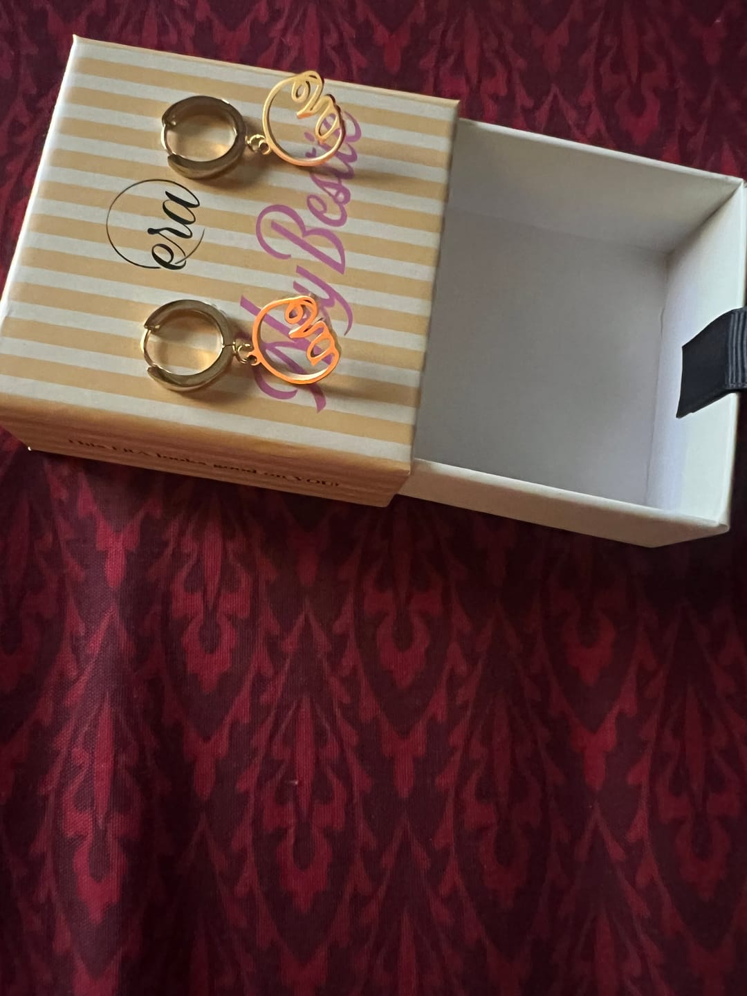 Customer photo review of Gold Precious Logo Earrings