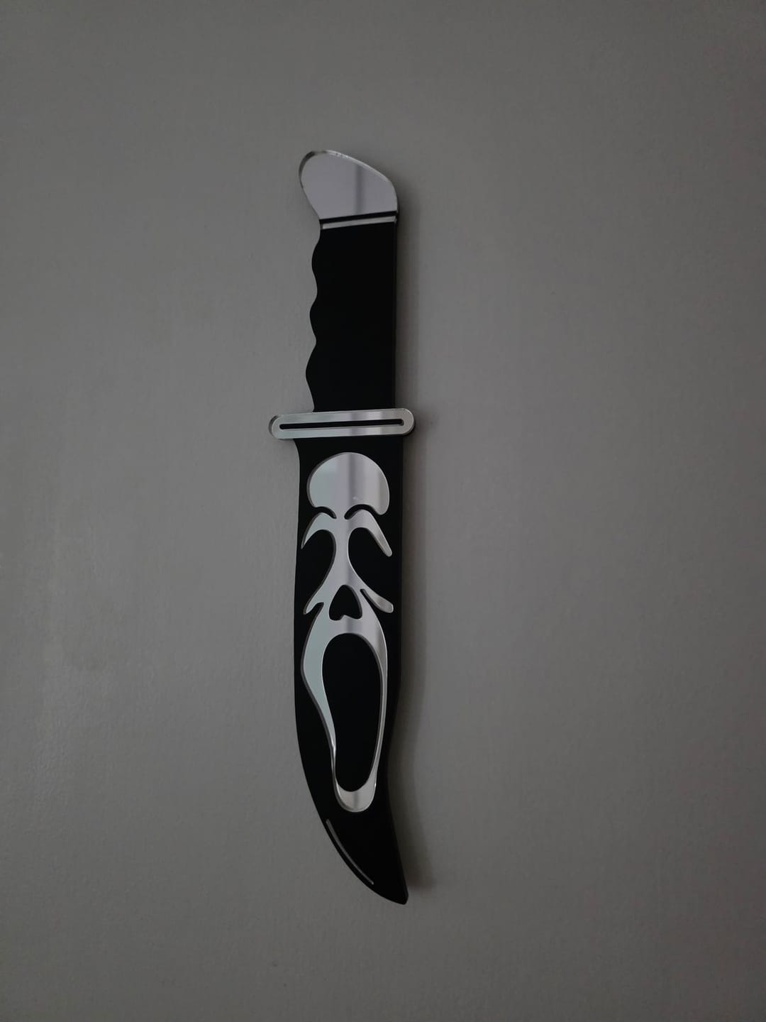 Customer photo review of Slasher Knife Mirror Wall Art