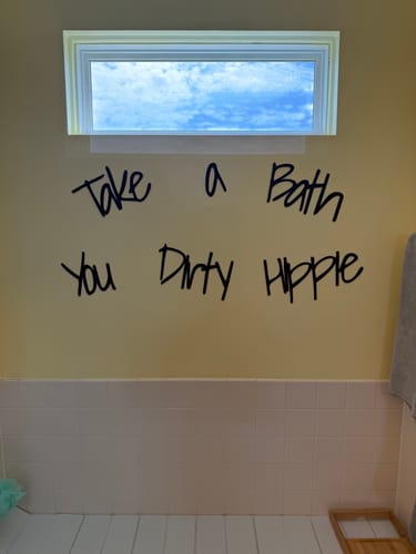 Customer photo review of Take A Bath You Dirty Hippie Wall Art