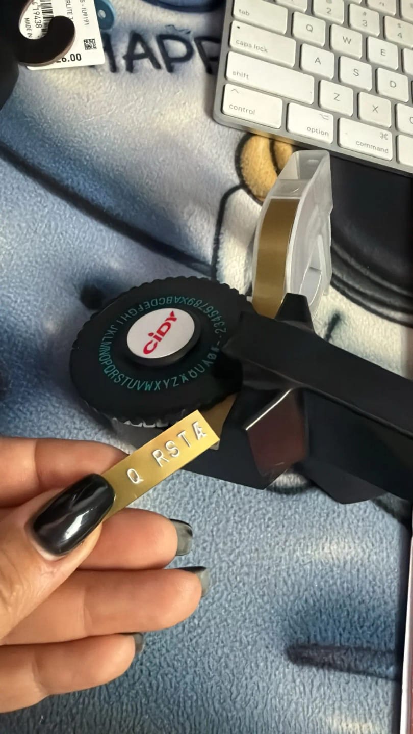 Customer photo review of C101 Mini DIY Manual Typewriter with 3 tapes (9mm x 3mtrs) Tape Embossing Label Maker Typewriter