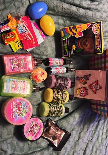 Reviewer's Jumbo Box Set laid out, showing many themed cosmetics, treats, and a collectible figure.