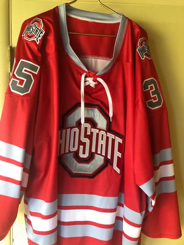 Reviewer's custom red hockey jersey with gray details, showing the 'OHIO STATE' logo and lace-up neck.