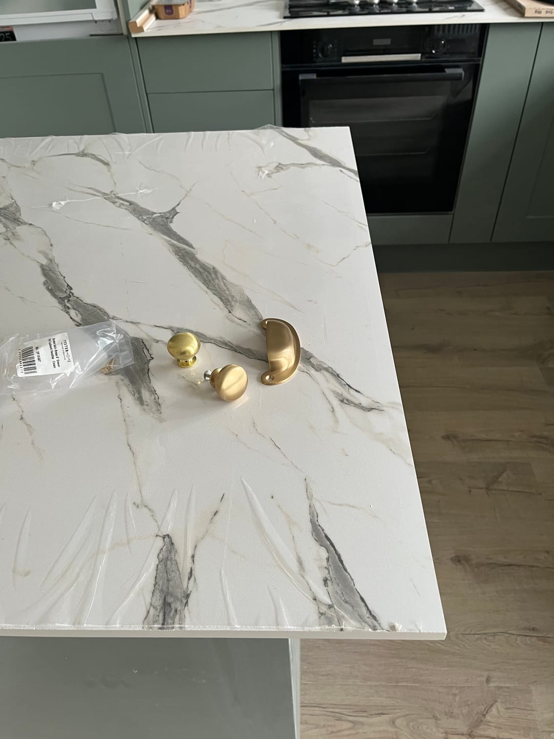 Customer photo review of Classic Brushed Satin Brass Cupboard Handles | Unlacquered