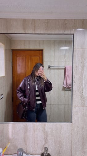 Reseña con foto de un cliente sobre Cartera Bandolera Tachas Éclat