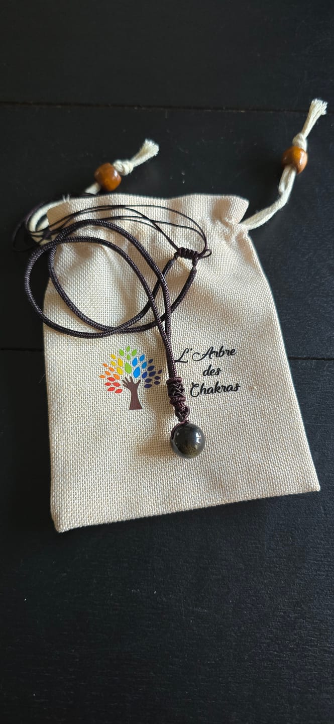 Customer photo review of Pendentif "Sphère" en Obsidienne Dorée