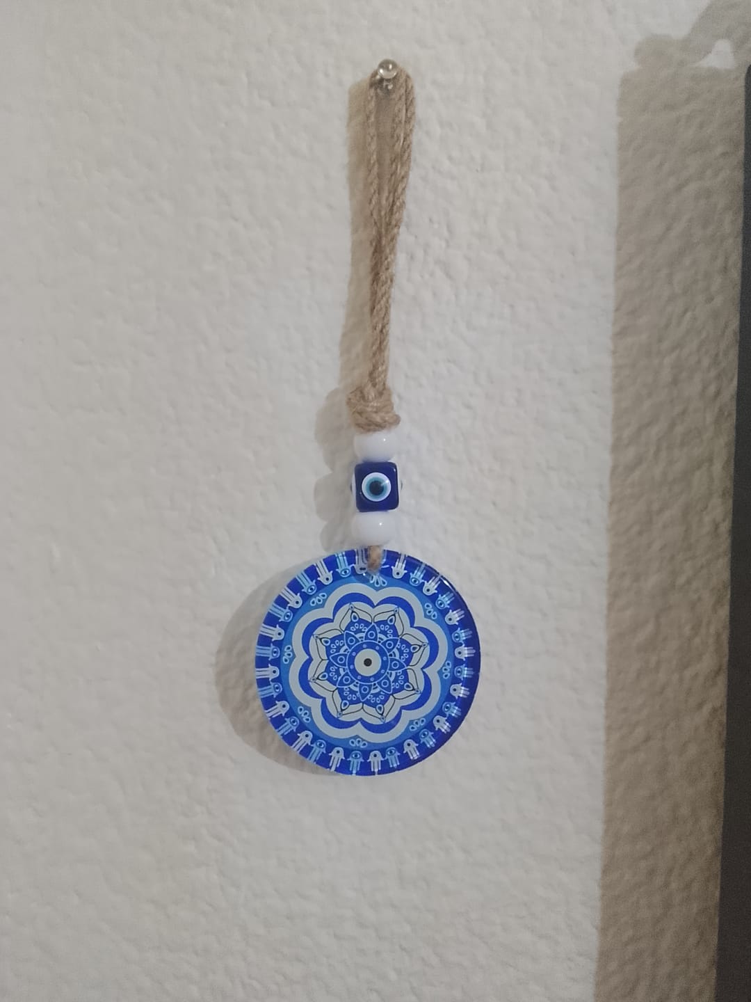 Customer photo review of Amuleto Ojo Turco con Mandala - Cristal || Protección Energética para tu hogar