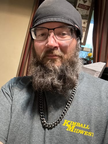 Reviewer wearing the thick Knights Templar Cuban Link Necklace over a grey t-shirt.