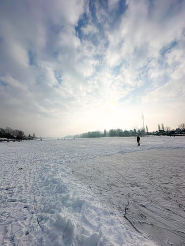 Customer's photo of a vast, snowy landscape edited with the BRIGHT & AIRY LIGHTROOM PRESETS for a bright, airy look.