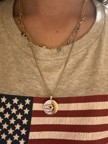 Customer photo review of Iris Waterfall Huggie Earrings