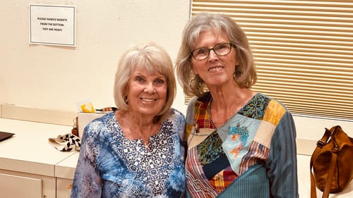 A smiling customer with a friend, showing positive results from the Seranova Micro Infusion System.