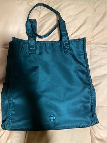 Reseña con foto de un cliente sobre Cartera De Hombro Para Notebook