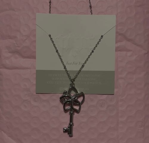 Customer photo review of Smeraldo Key Pendant Necklace