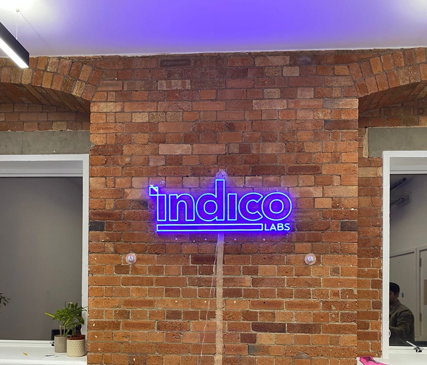 Customer photo review of Custom Neon Sign for Indico Labs - Adam