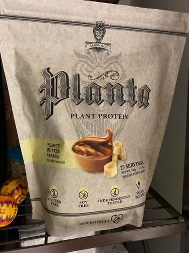 Customer's bag of Planta Plant Protein in Peanut Butter Banana flavor sitting on a shelf.