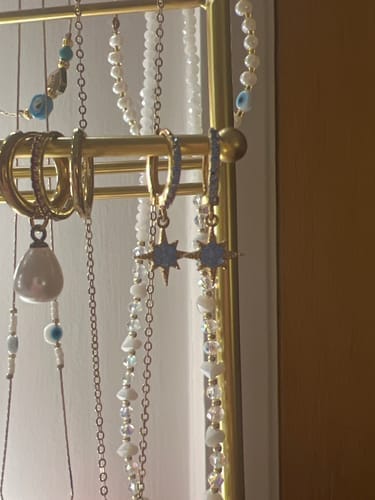 Customer photo review of Cosima Star Huggie Earrings