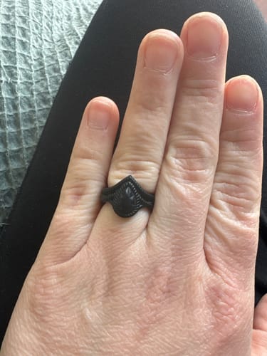 Customer's hand wearing the stylish black Silicone Pear Diamond Ring.