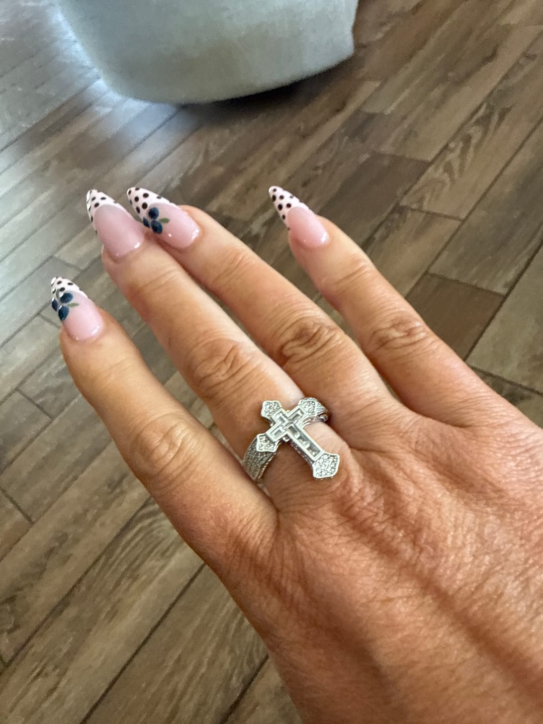 Customer photo review of Christianartworkshop Central Cross Motif Ring with Cubic Zirconia Accents: Carry His Care in Daily Wear