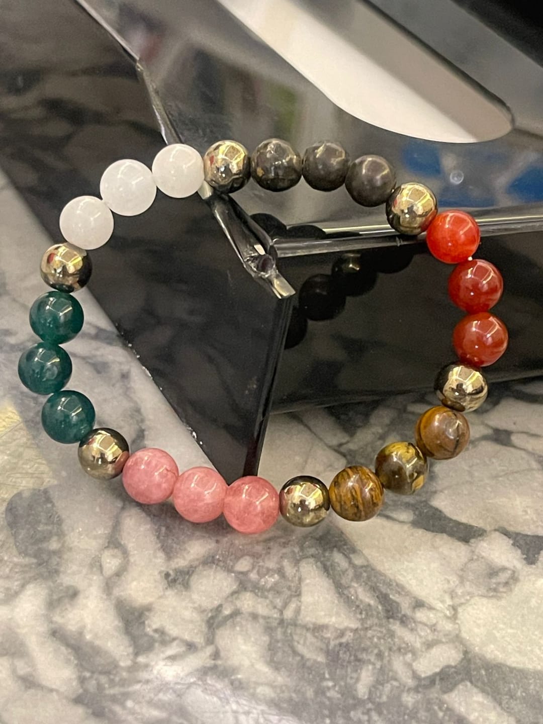 Customer photo review of Dhan Vriddhi Crystal Bracelet – Vastu Remedy for Wealth Attraction | Prosperity Energy Activator | 8 mm Beads