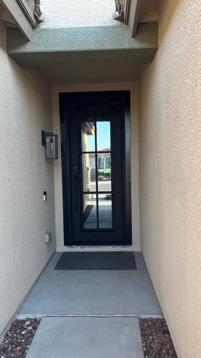 Customer photo review of Covington Model Pre Hung Single Front Entry Wrought Iron Door With Low E Clear Glass Dark Bronze Finish