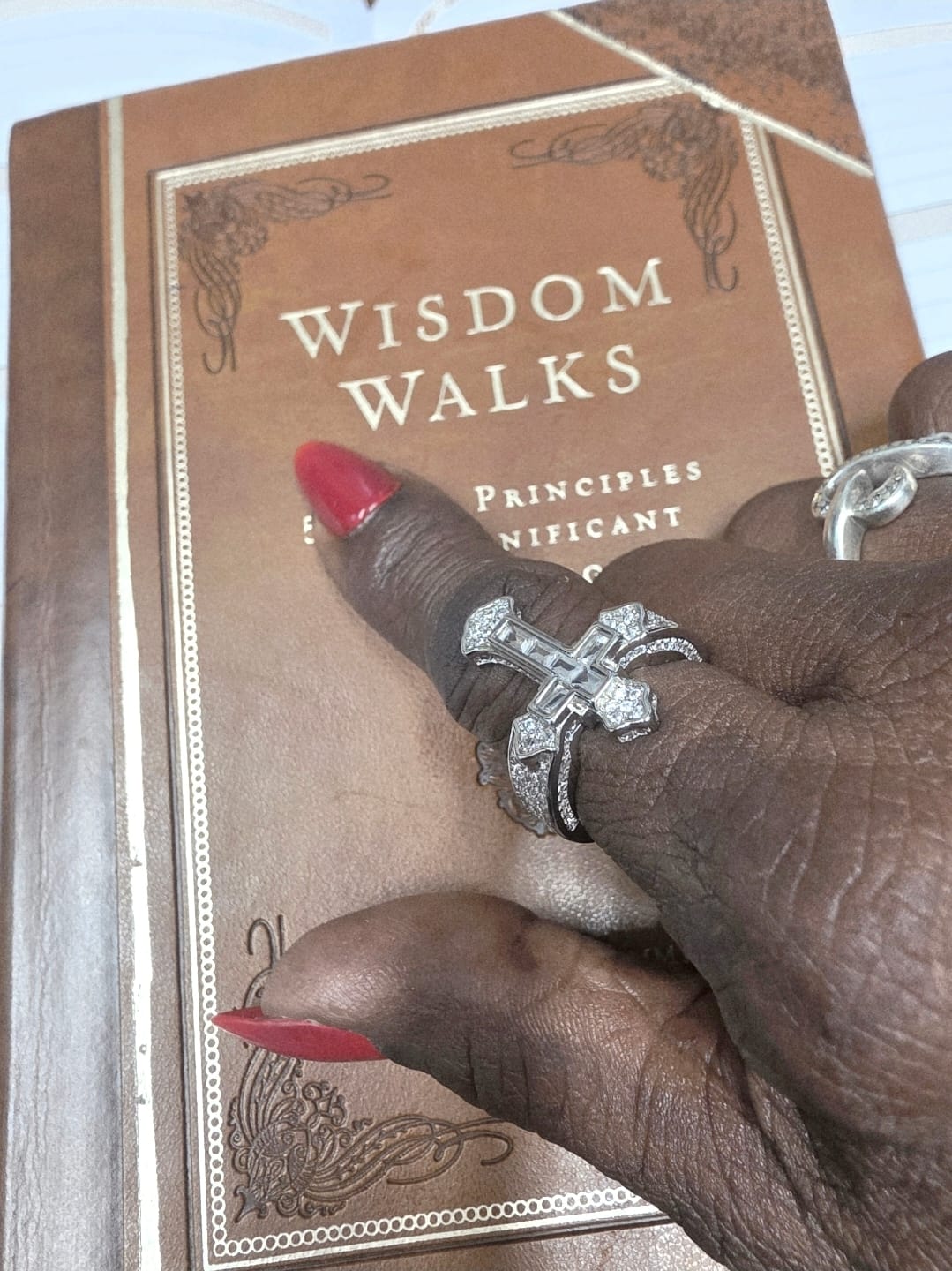 Customer photo review of Christianartworkshop Central Cross Motif Ring with Cubic Zirconia Accents: Carry His Care in Daily Wear